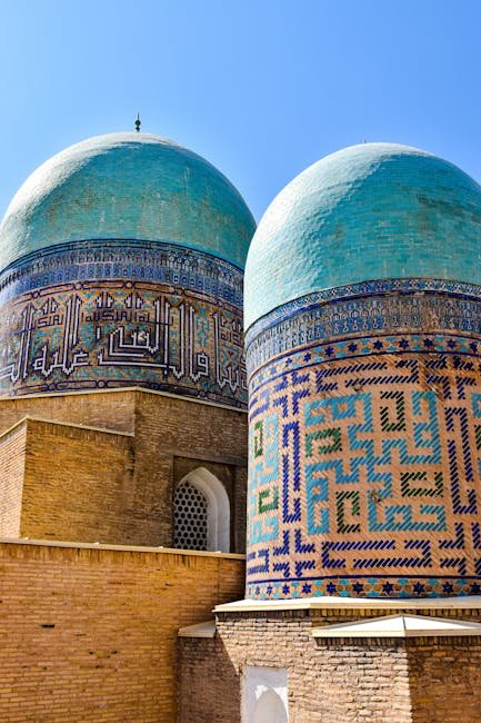 Beautiful domes of the Shah-i-Zinda mausoleum in Samarkand, Uzbekistan, showcasing intricate mosaics and architecture.